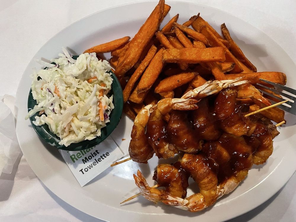 Bacon Wrapped Shrimp with sweet potato fries and coleslaw